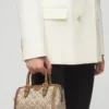 1417a4ee-0acd-48de-bb6f-942ea47d365b20231202012207 Tory Burch Mini T Monogram duffle bag Hazelnut