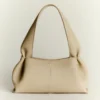 Polène Numéro Neuf East West Edition Textured SAND